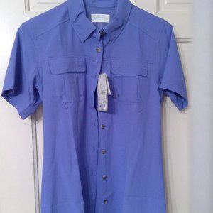 Beautiful periwinkle blue short sleeved sports shirt with spf 50.